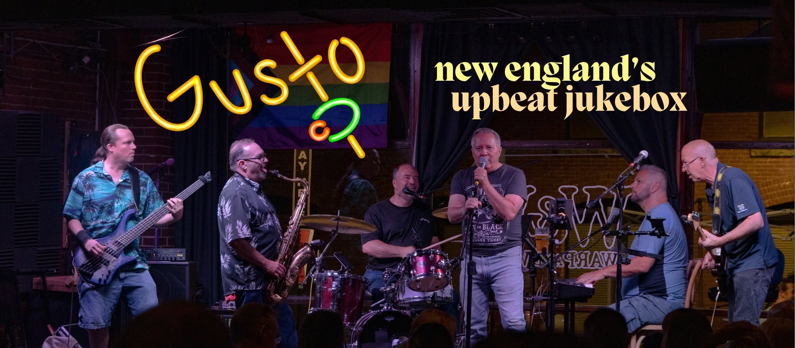 Gusto band performing live on stage
